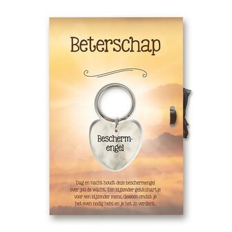 Sleutelhanger in de vorm van een gelukshartje voor beterschap.