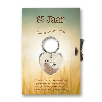 Kaart met de tekst: &#039;Gefeliciteerd met je 65e verjaardag! Speciaal voor jou dit gelukshartje.