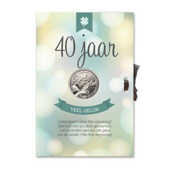 Geluksmunt voor 40 jaar, een uniek verjaardagscadeau verpakt in een stijlvolle kaart.