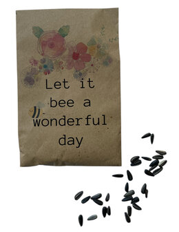 Zakje met zonnebloemzaden met tekst &#039;Let it be a wonderful day&#039;